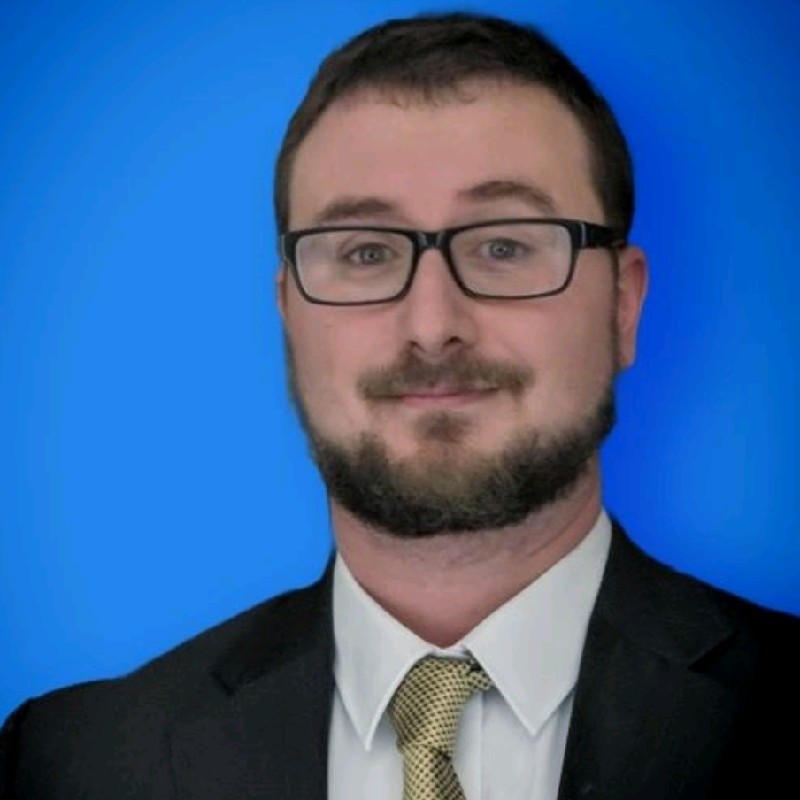 Portrait of Travis DeShazo